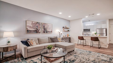 a living room with a couch and a table